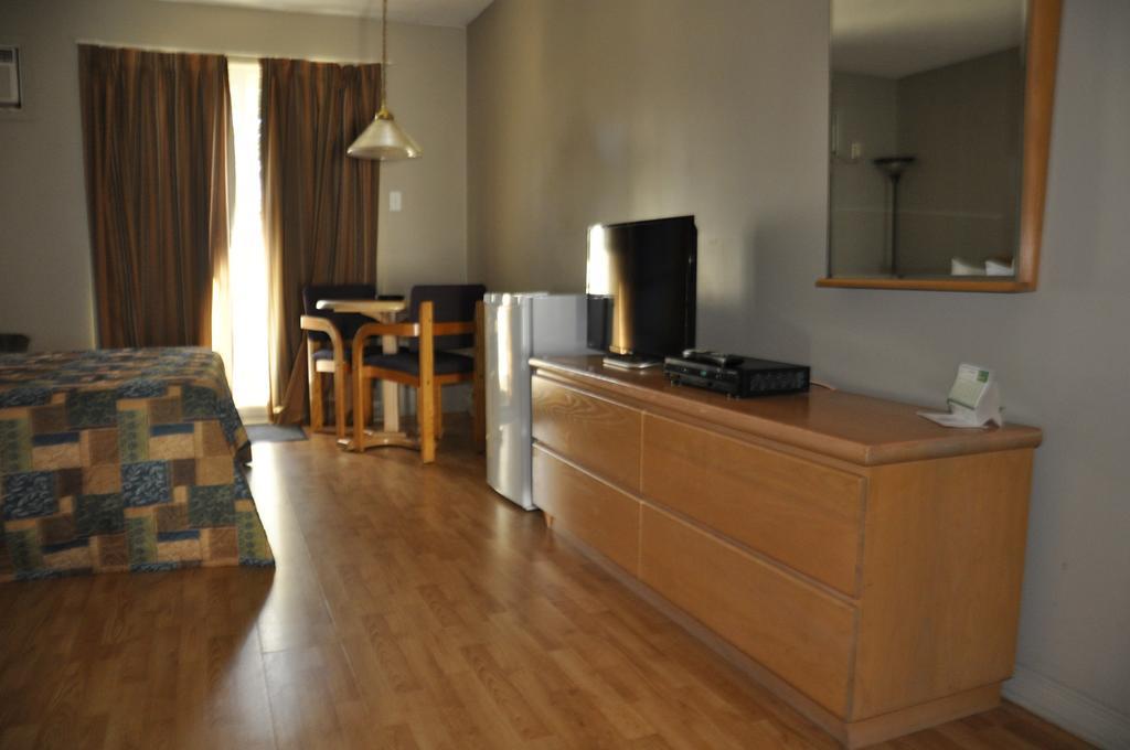Motel Les Pignons Verts Buckingham Quarto foto