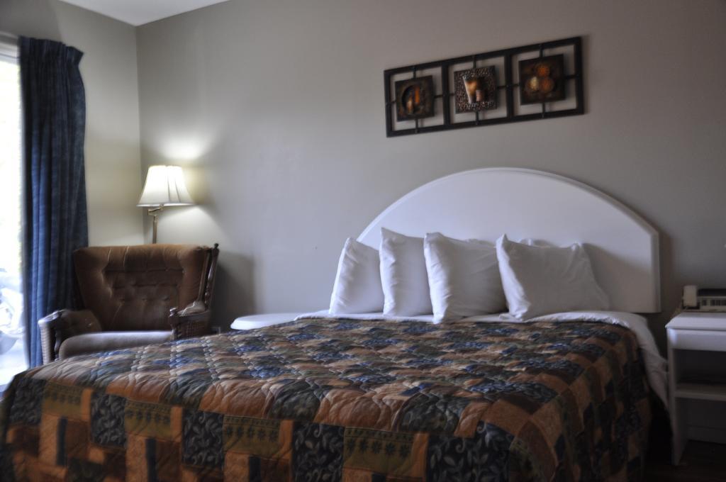 Motel Les Pignons Verts Buckingham Quarto foto